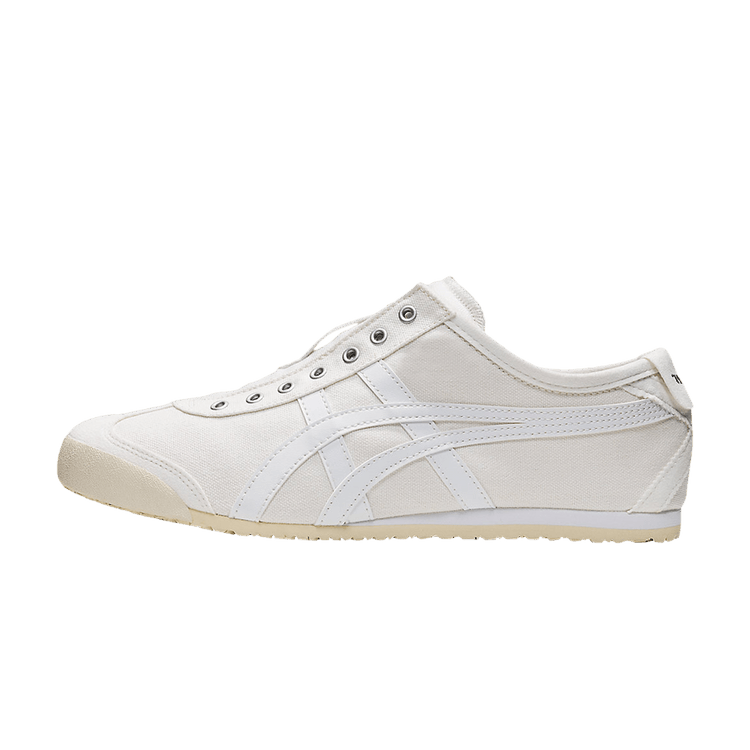 Onitsuka Tiger Mexico 66 Slip-On White, zijaanzicht met witte canvas, gestreepte stiksels en roomkleurige zool