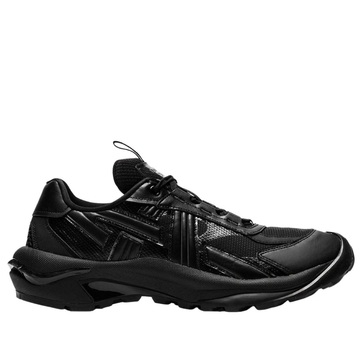 Onitsuka Tiger Tigtrail Black, zijaanzicht opnieuw van mesh en leer silhouet
