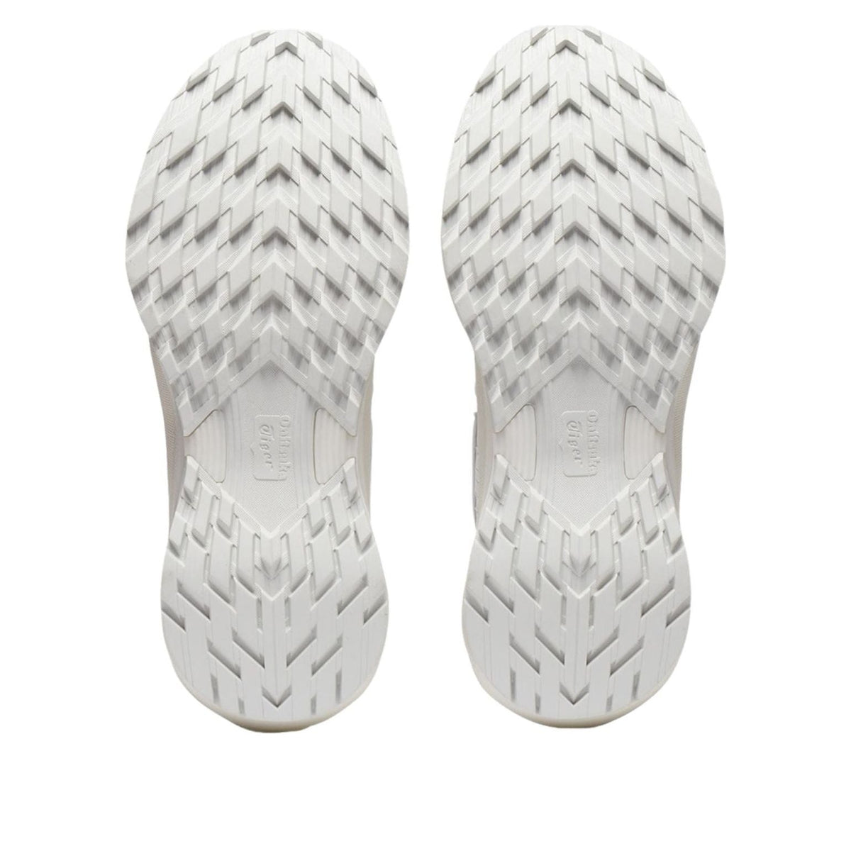 Onitsuka Tiger Tigtrail White, zoolprofiel met pijlvormig patroon en merkinscriptie
