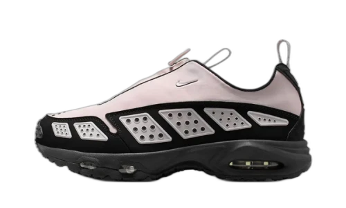 Nike Air Max SNDR Pink, zijaanzicht met roze en zwarte kleurvlakken, witte zoolprofiel en Air Max zool, getrokken sluiting