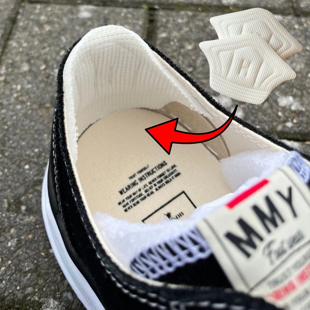 Heelpads Cream, detailfoto van de binnenkant van de schoen met witte ribbelstructuur en zwarte zool