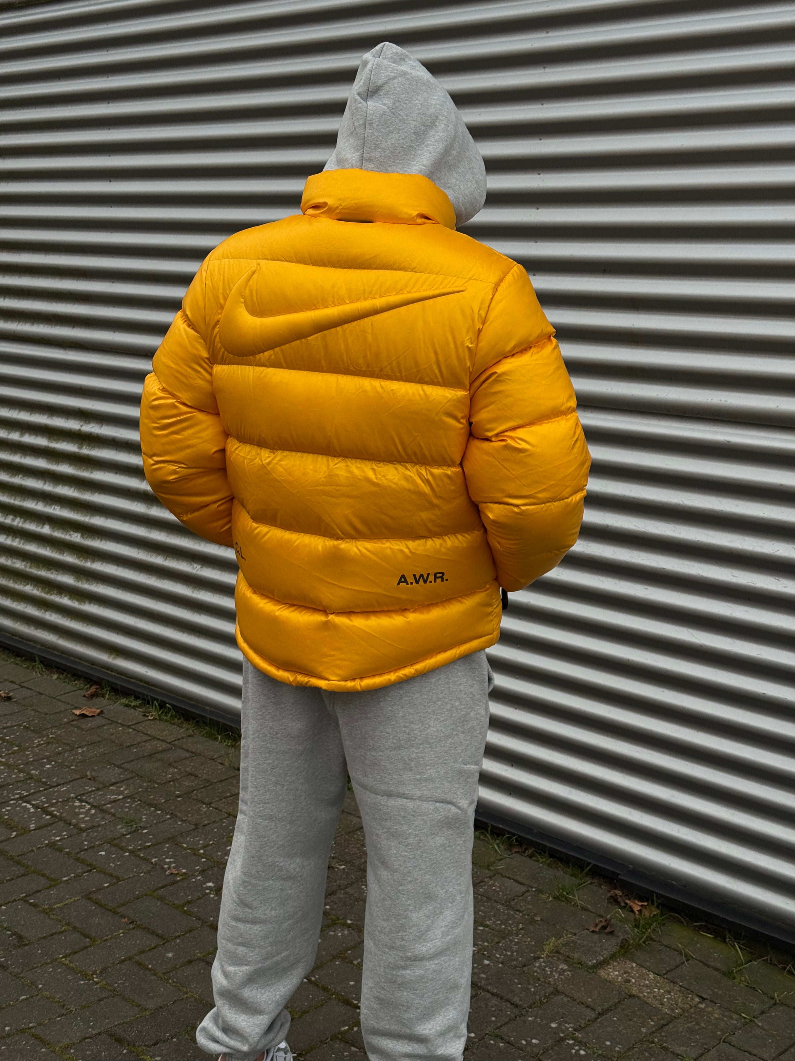 Nike x NOCTA Sunset Puffer Jacket Yellow