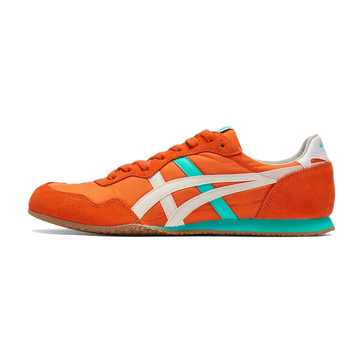 Onitsuka Tiger Serrano Habanero Birch, zijaanzicht met oranje suède, witte streep en turquoise zooldetail