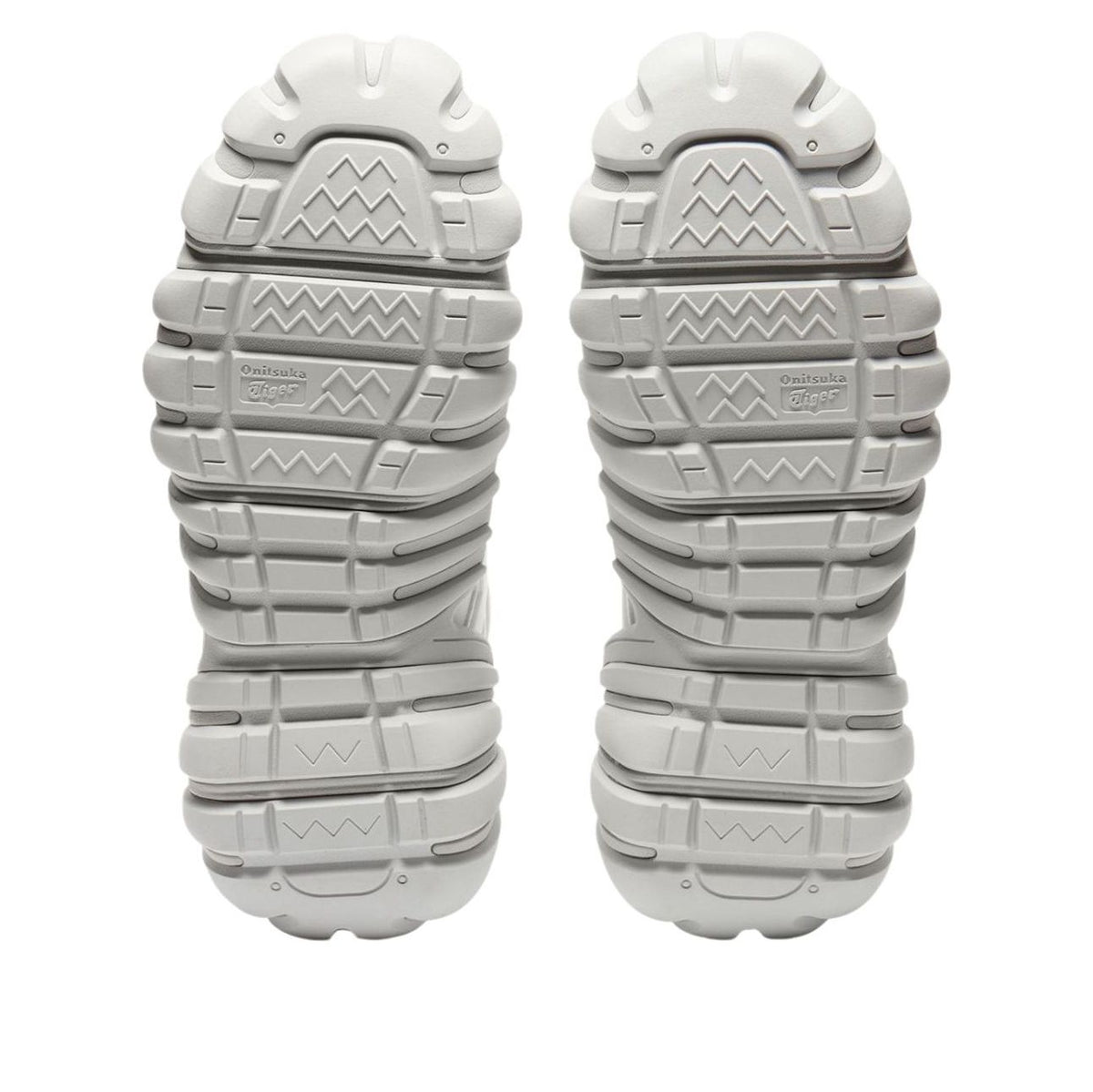 Onitsuka Tiger Dentigre LS White Metallic Silver zoolprofiel met chevronpatroon en merknaam