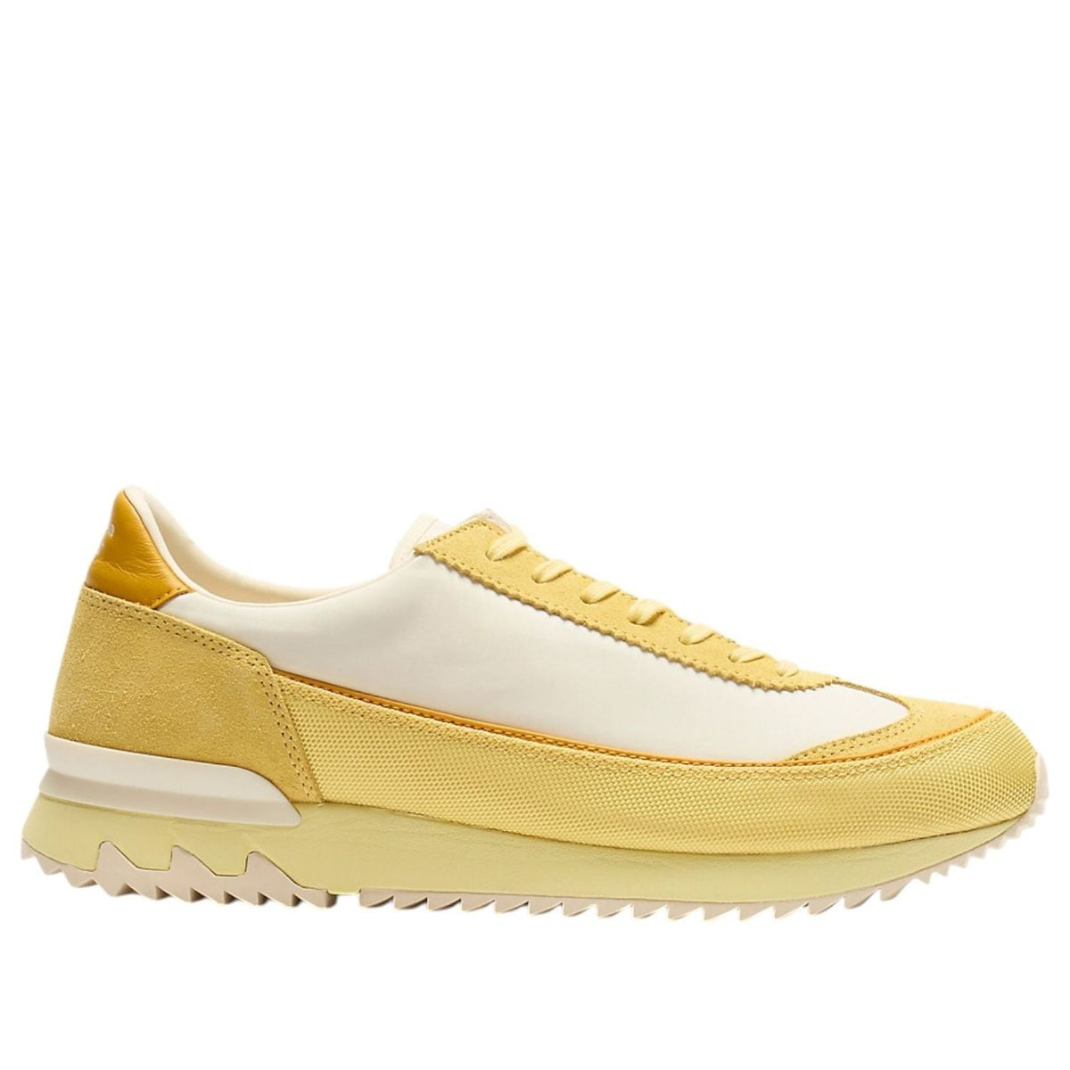Onitsuka Tiger HSINTI Ivory Faded Yellow, zijaanzicht toont gelaagde zool en gele vetersluiting