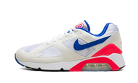 Nike Air Max 180 Ultramarine, zijaanzicht met crèmewitte, blauwe en rode kleurvlakken, zichtbare Air-zool