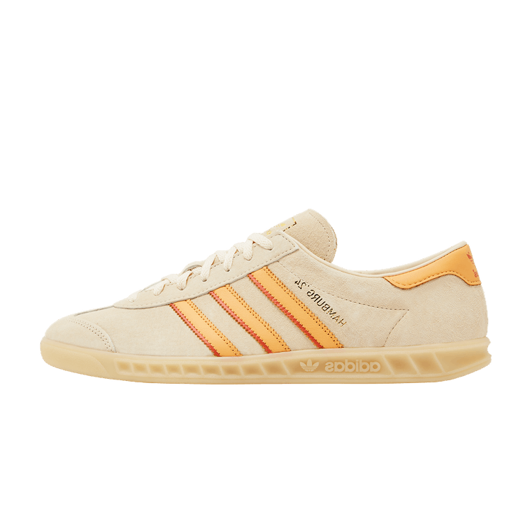 adidas Hamburg Crystal Sand Hazy Orange, zijaanzicht met beige canvas, oranje strepen en crème zool